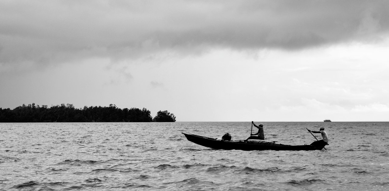 A fisherman's boat on calm water