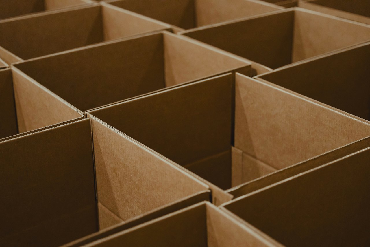 Open cardboard boxes seen from above