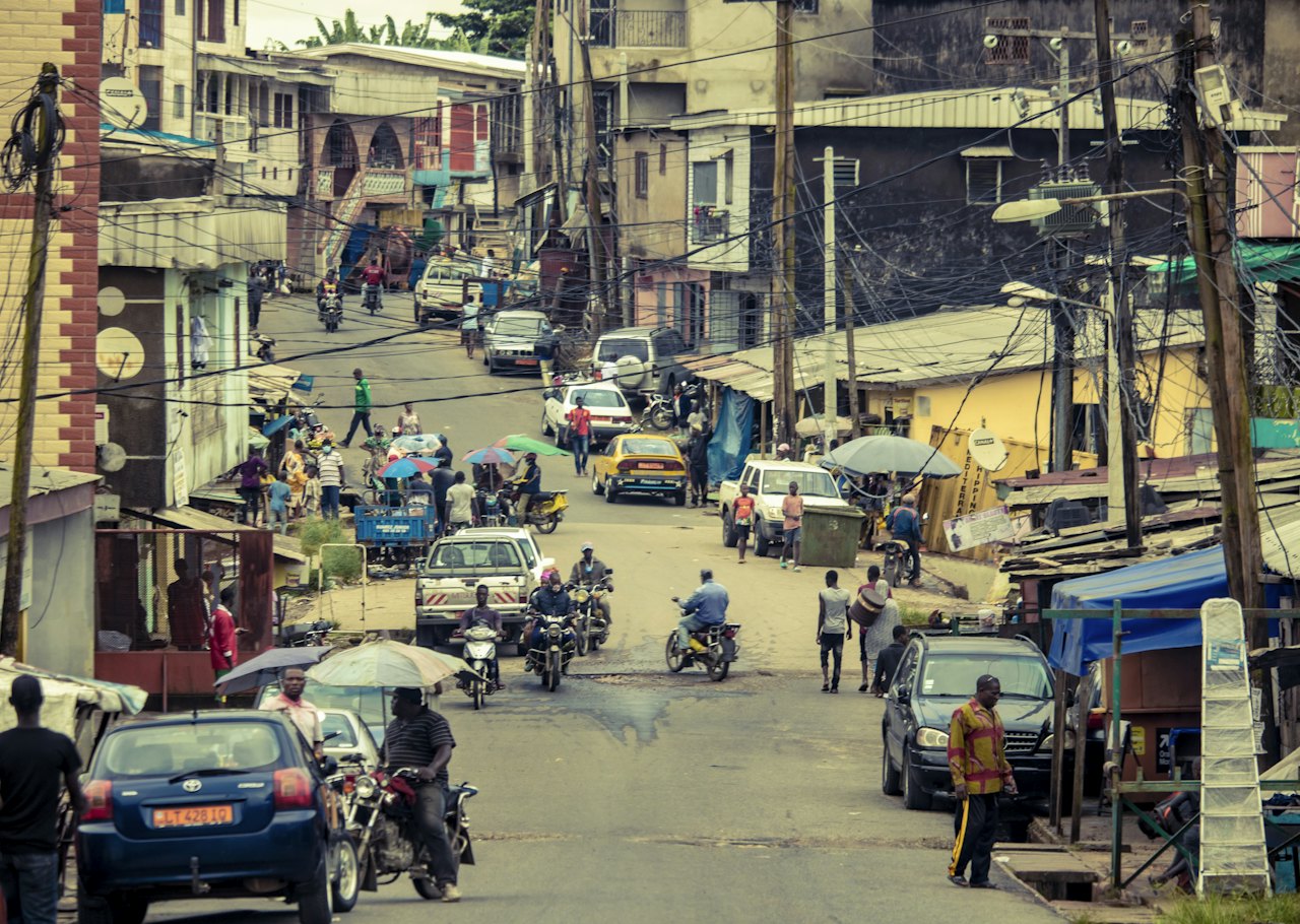 People walking on a street in Cameroon
