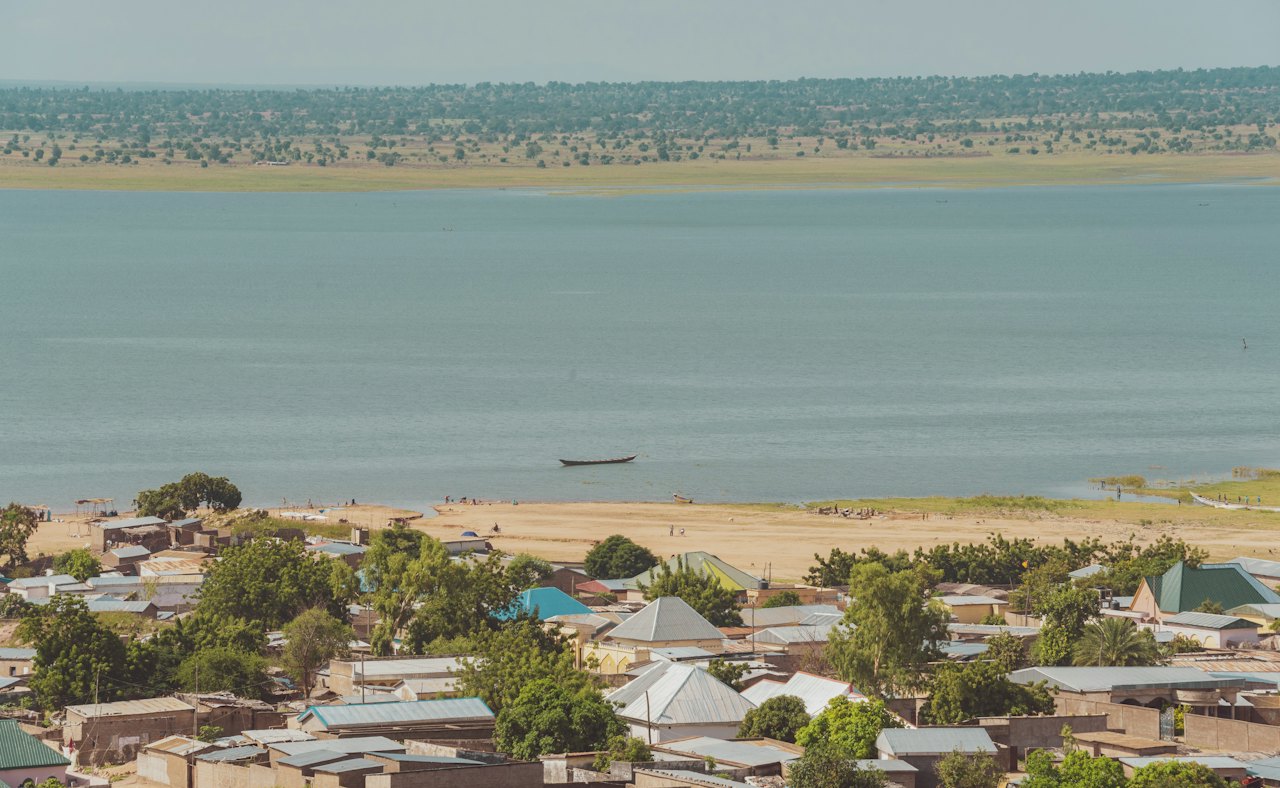 A coastal town beside a wide stretch of water